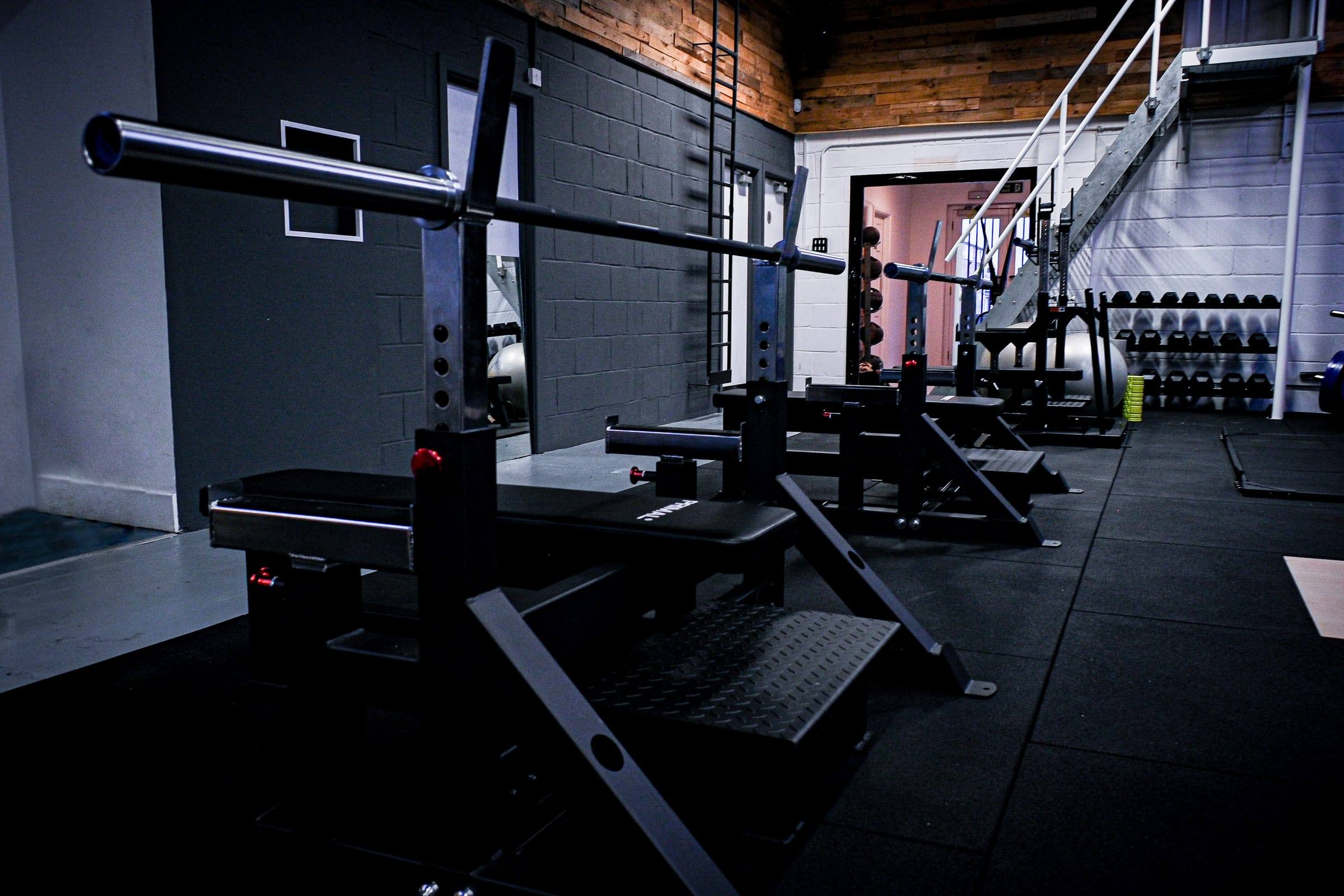 Competition-style bench press station at Base Gym Yeovil