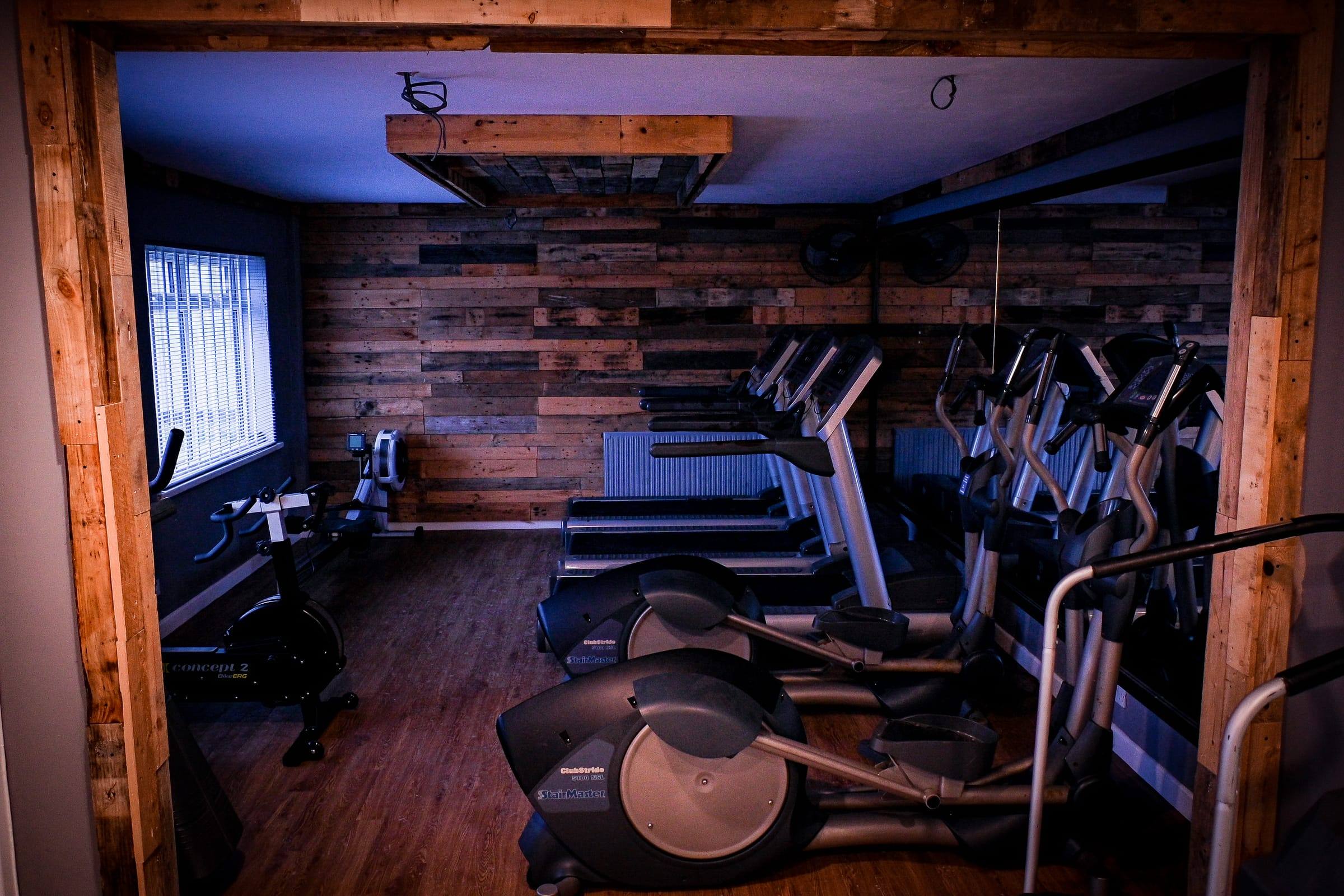 Cross-trainers in the timber-clad Yeovil cardio room